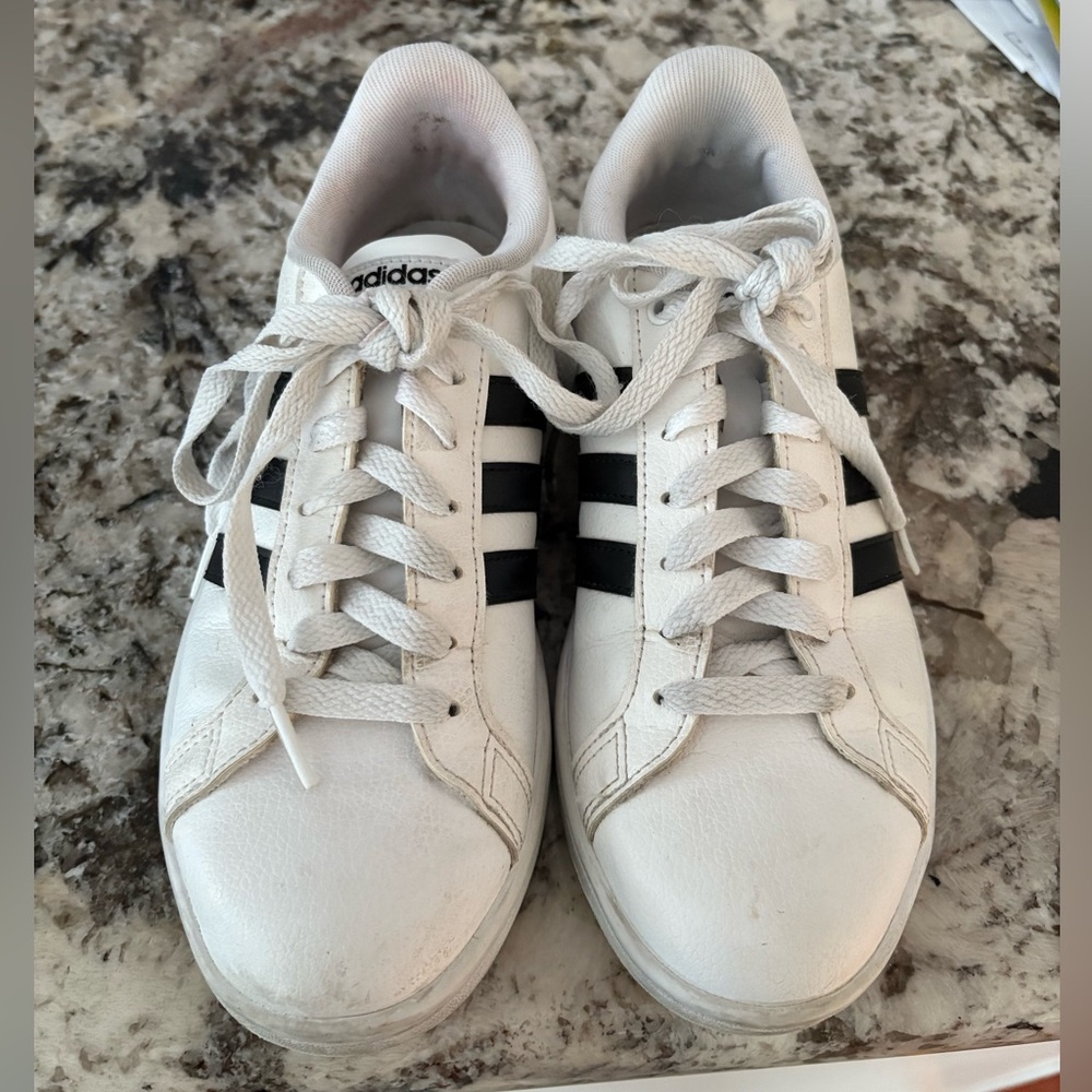 Adidas woman’s  White Sneaker with Black Stripes